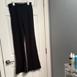 DSG Black Flare Women's Pants size medium. Slit around bottom cuffs